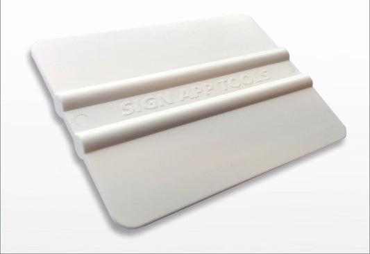 1x plastic squeegee. 101 x 75mm