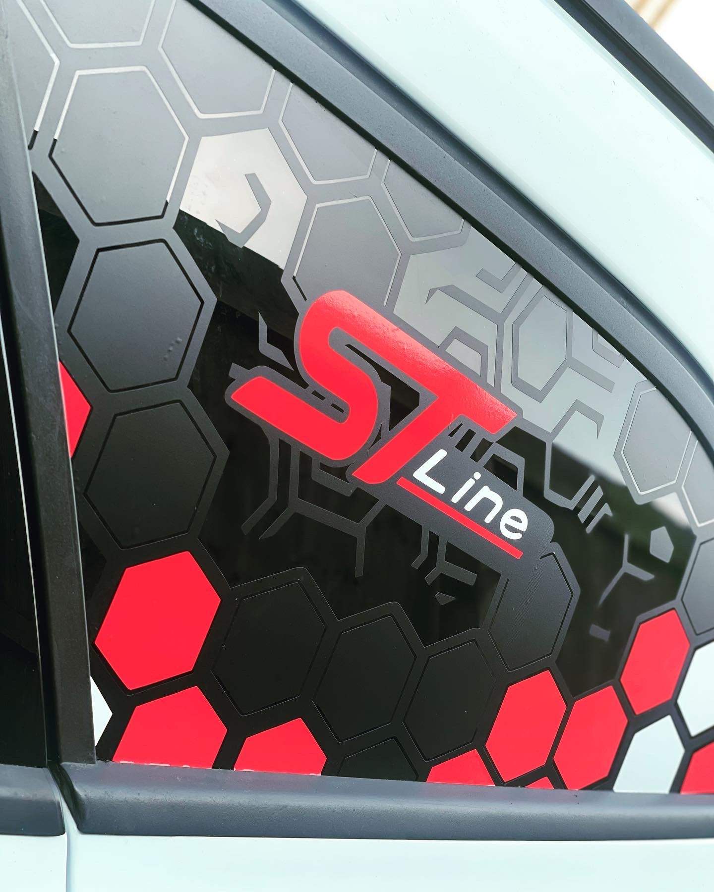 image_1c2e9b82-824c-44a6-837e-b70d79c8a7e8 - R&E Wraps and Graphics LTD - Ford Focus Estate ST Line Honey Comb Window Stickers - honey comb, side window decals, st line, St line window stickers, st window decals, stickers