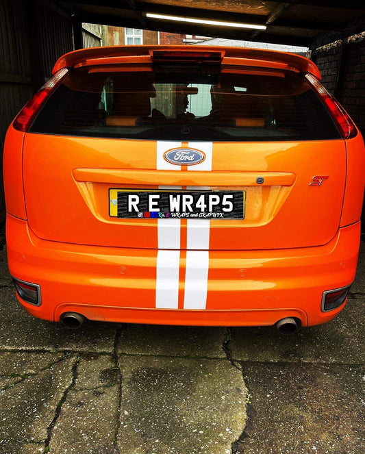 image_8eb8a05e-a59f-40db-92a3-23ed0d7f5c17 - R&E Wraps and Graphics LTD - Ford Focus ST Racing Stripes - ford, ford focus racing stripe, racing stripes, st racing stripe